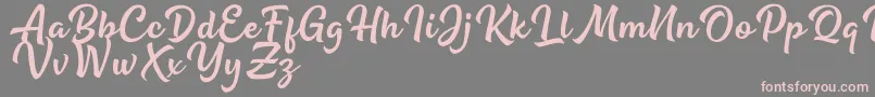 Be Strong regular Font – Pink Fonts on Gray Background