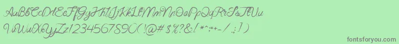 Beast Fantasia Font – Gray Fonts on Green Background