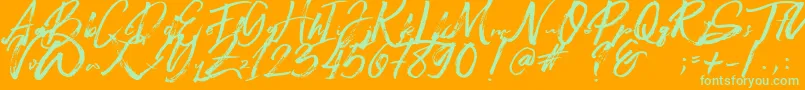 Beastmachine Font – Green Fonts on Orange Background