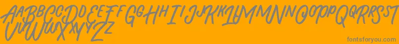 Beasty Morty-Schriftart – Graue Schriften auf orangefarbenem Hintergrund