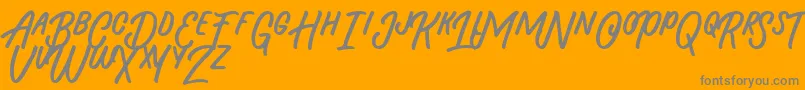 Beasty Morty Font – Gray Fonts on Orange Background