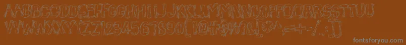 BeatnikHayseed-fontti – harmaat kirjasimet ruskealla taustalla