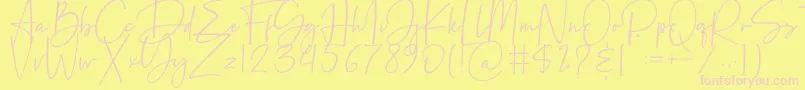 Beatrise-Schriftart – Rosa Schriften auf gelbem Hintergrund
