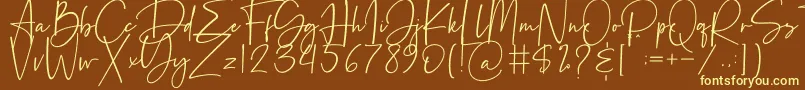 Beatrise-fontti – keltaiset fontit ruskealla taustalla