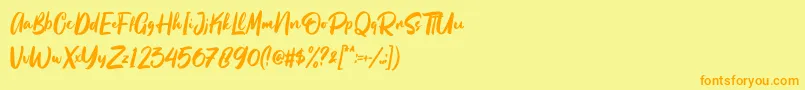 Więcej informacji o czcionce Beattingvile Czcionka Beattingvile – pomarańczowe czcionki na żółtym tle