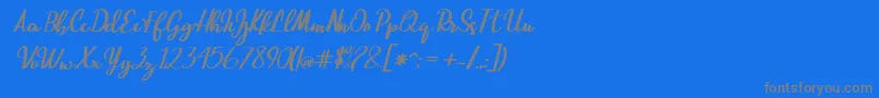 Czcionka Beautiful Script – szare czcionki na niebieskim tle