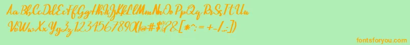 Шрифт Beautiful Script – оранжевые шрифты на зелёном фоне