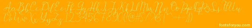 Beauty Font – Yellow Fonts on Orange Background