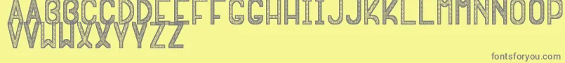 EskimporceVsf Font – Gray Fonts on Yellow Background