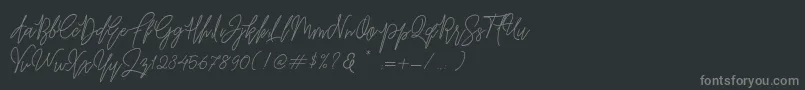 Befindisa-fontti – harmaat kirjasimet mustalla taustalla