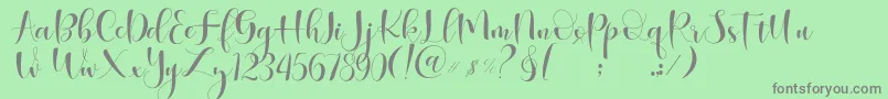 Begokly Font – Gray Fonts on Green Background