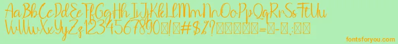 BeHodakga Font – Orange Fonts on Green Background