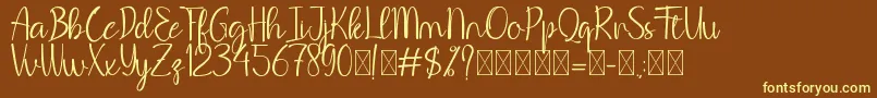 BeHodakga Font – Yellow Fonts on Brown Background