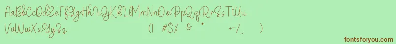 Belandia Font – Brown Fonts on Green Background