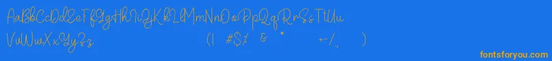 Belandia Font – Orange Fonts on Blue Background