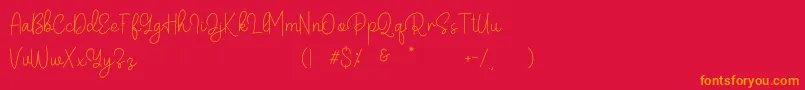 Belandia-Schriftart – Orangefarbene Schriften auf rotem Hintergrund