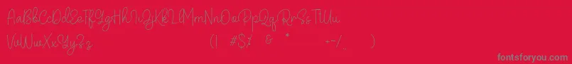 Belandia-Schriftart – Graue Schriften auf rotem Hintergrund