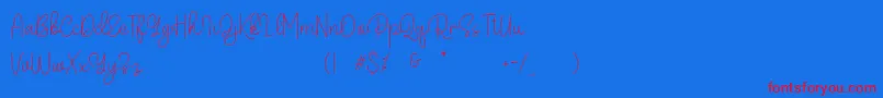 Belandia Font – Red Fonts on Blue Background
