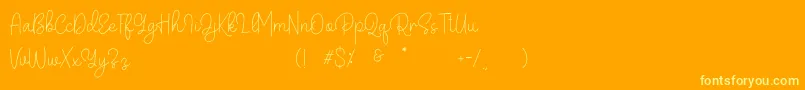 Belandia Font – Yellow Fonts on Orange Background