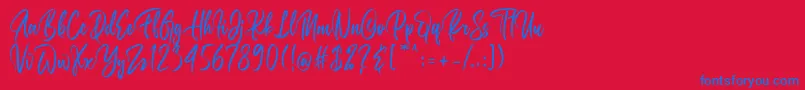 Belgedes-Schriftart – Blaue Schriften auf rotem Hintergrund
