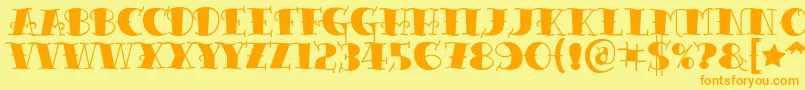 フォントTattooletteringblack – オレンジの文字が黄色の背景にあります。