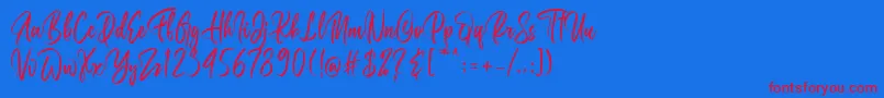 Belgedes Font – Red Fonts on Blue Background