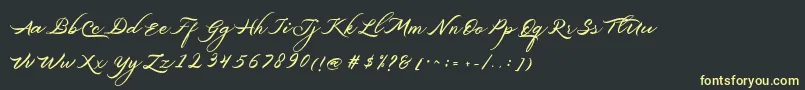 フォントBelgiansignature – 黒い背景に黄色の文字