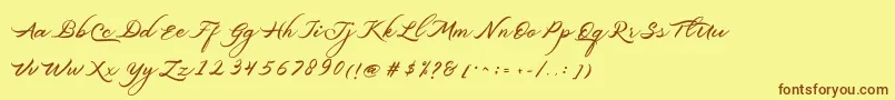 フォントBelgiansignature – 茶色の文字が黄色の背景にあります。