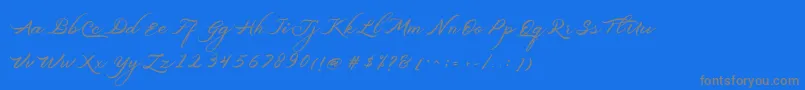 フォントBelgiansignature – 青い背景に灰色の文字