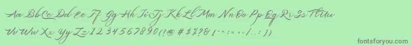 フォントBelgiansignature – 緑の背景に灰色の文字