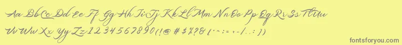 Belgiansignature-Schriftart – Graue Schriften auf gelbem Hintergrund