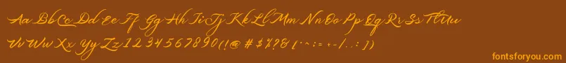 フォントBelgiansignature – オレンジ色の文字が茶色の背景にあります。