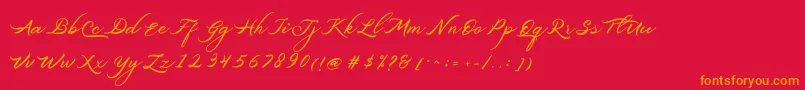 フォントBelgiansignature – 赤い背景にオレンジの文字