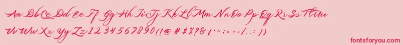 フォントBelgiansignature – ピンクの背景に赤い文字