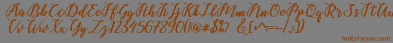 Belinda Script Font – Brown Fonts on Gray Background