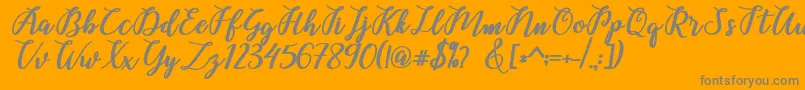 Belinda Script Font – Gray Fonts on Orange Background