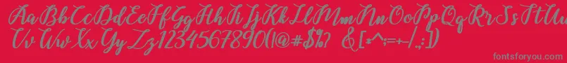 Belinda Script Font – Gray Fonts on Red Background