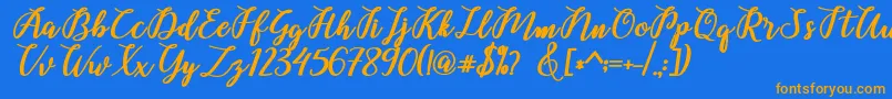 Belinda Script Font – Orange Fonts on Blue Background