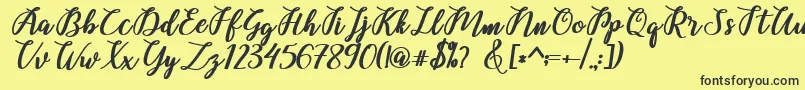 Belinda Script Font – Black Fonts on Yellow Background