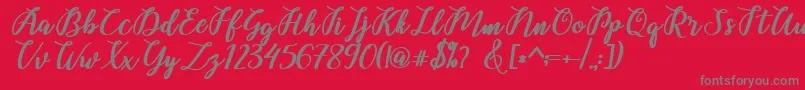 Belinda Script-Schriftart – Graue Schriften auf rotem Hintergrund