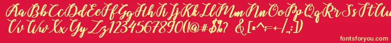 Belinda Script Font – Yellow Fonts on Red Background