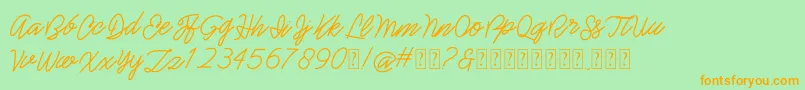 belinda Font – Orange Fonts on Green Background