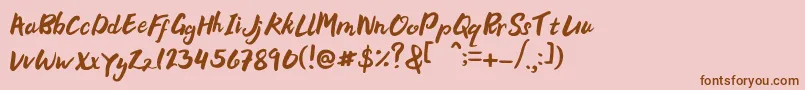フォントBellania – ピンクの背景に茶色のフォント
