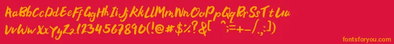 フォントBellania – 赤い背景にオレンジの文字