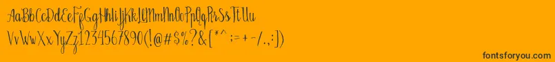 Czcionka Bellanie Script Free Demo – czarne czcionki na pomarańczowym tle