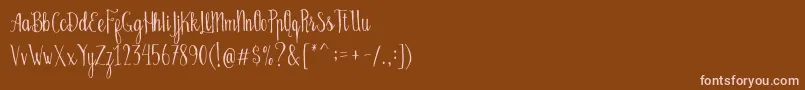 Шрифт Bellanie Script Free Demo – розовые шрифты на коричневом фоне