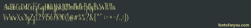 Fonte Bellanie Script Free Demo – fontes amarelas em um fundo preto