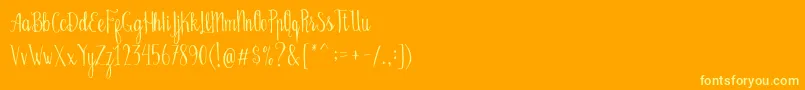 Bellanie Script Free Demo-fontti – keltaiset fontit oranssilla taustalla