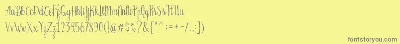 Bellanie Script Free Demo Font – Gray Fonts on Yellow Background