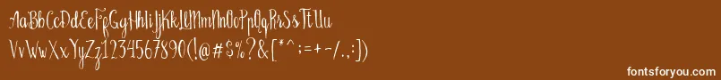 fuente Bellanie Script Free Demo – Fuentes Blancas Sobre Fondo Marrón